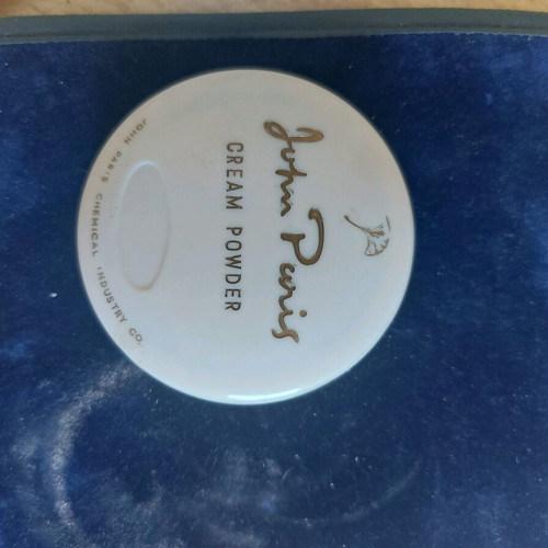 John Paris vintage powder compact used, shell-shaped