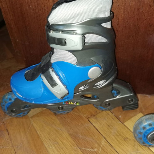 Children's blue rollers used, size about 29-32