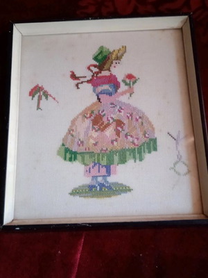 Framed fine cross-stitch girl with flower used