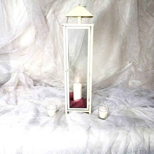 Set of used off-white metal floor lanterns for wedding and baptism