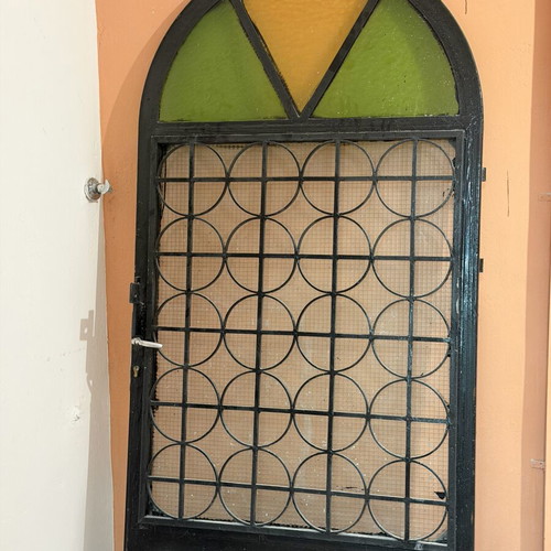 Solid iron door with panel, opening