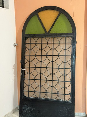 Solid iron door with panel, opening