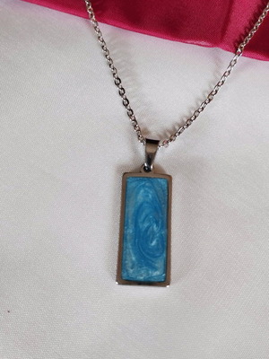 Necklace new, handmade, steel and resin in blue color