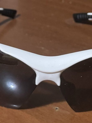 Uvex sunglasses with case, black and white