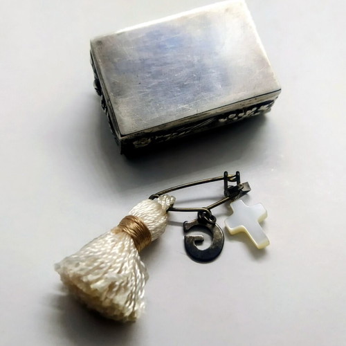 Old silver-plated pill box with embossed decoration like new