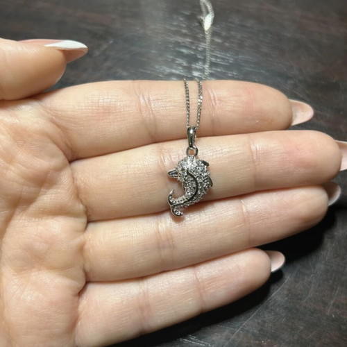 Dolphin Necklace like new, silver color