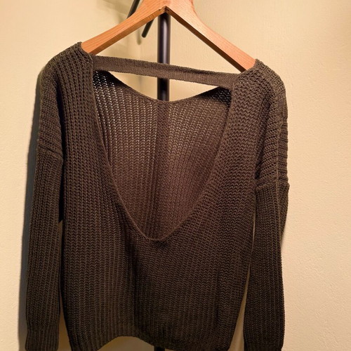 Knitted green sweater with open back, like new