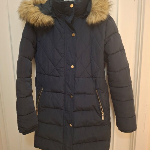 Medium blue jacket used with belt at waist