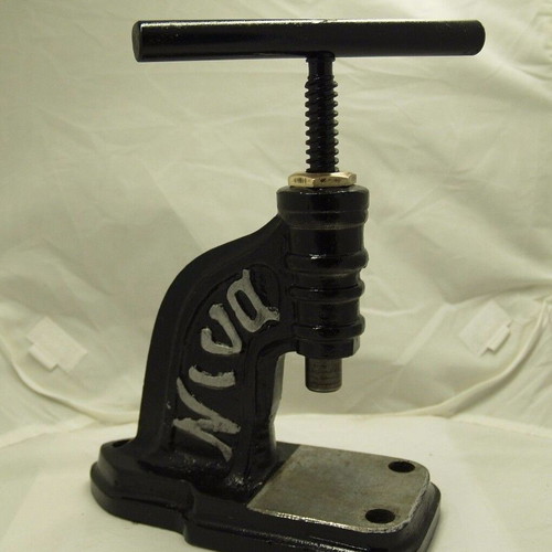 Vintage Greek button press used with NINA marking
