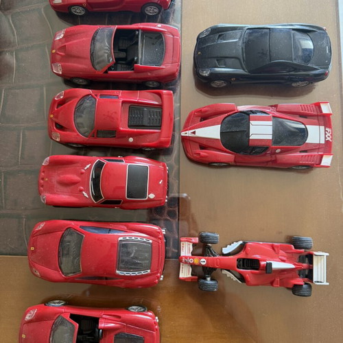 Ferrari miniature models with mechanism, like new, set of 9
