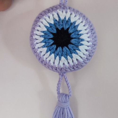Crochet hanging evil eye with lilac tassel new