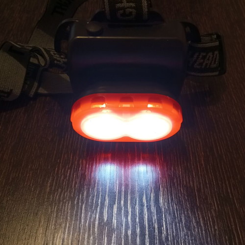 Headlamp like new, operates with 3 AA batteries