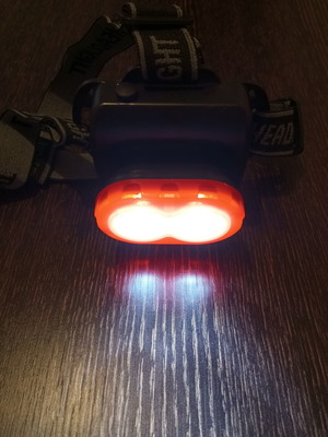 Headlamp like new, operates with 3 AA batteries