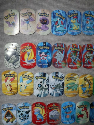 Pokemon collectible metaltags 2004, set of 65 plus 12 Ben10 tags