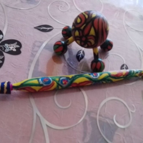 Wooden hand-painted massager