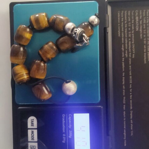 Begleri with tiger eye beads like new, 10 beads, 25 cm