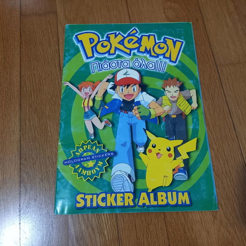 Collectible Pokemon sticker album like new, nearly complete