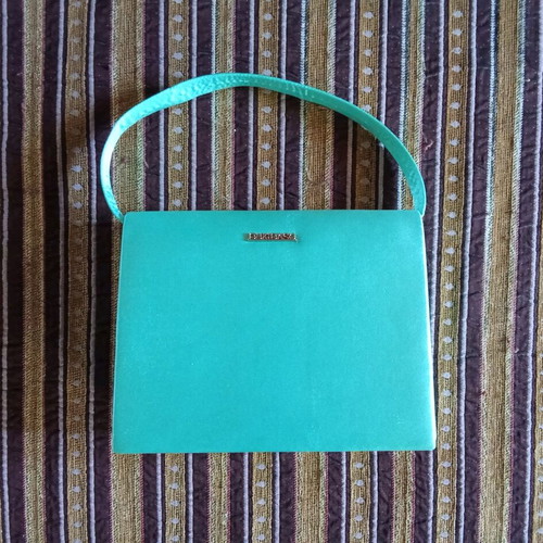 Satin bag unused with strap and chain turquoise