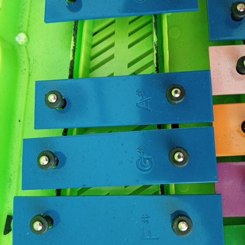 Metallophone used children's musical instrument in case