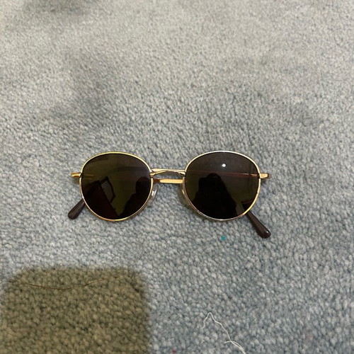 Round glasses used, black, with flawless lens