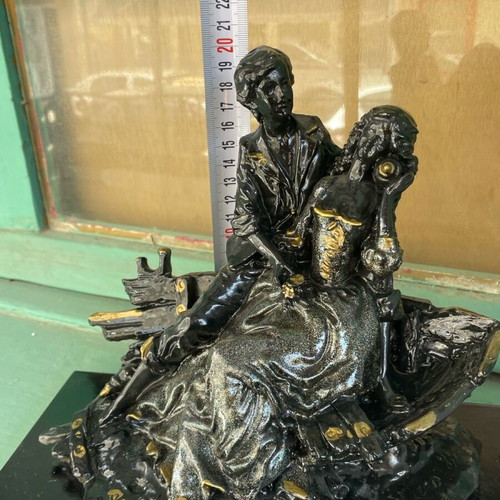 Vintage statue of a loving couple with wooden base like new