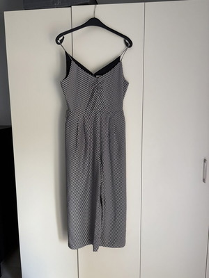 H&M jumpsuit with black and white stripes