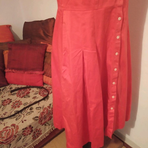 Dress with pleats and buttons used, size M