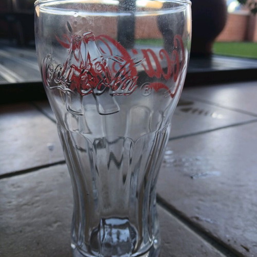 Coca Cola collectible glasses with embossed letters like new