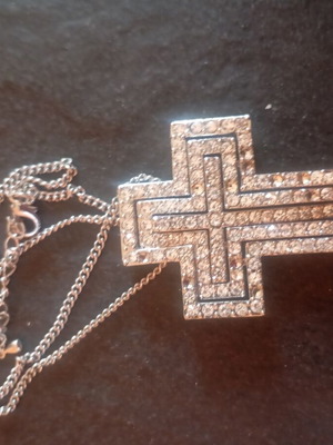 Necklace with cross used, missing some rhinestones