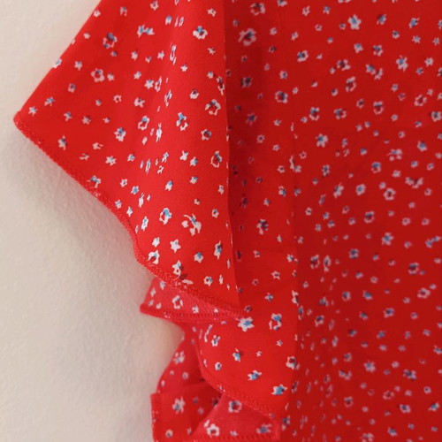 Floral top red like new with ruffles on sleeves