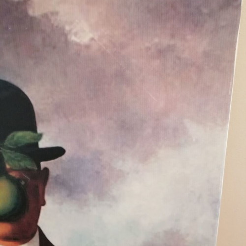 The Son of Man painting by Rene Magritte used, canvas print on wood frame