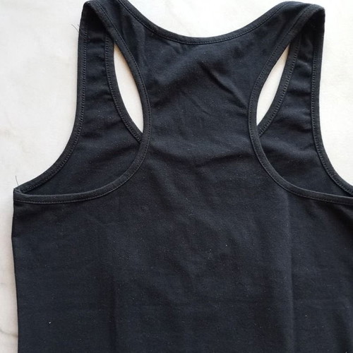 Sleeveless blouse with embroidered sequin girl face, like new, size S