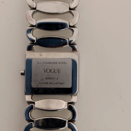 Vogue women's watch like new with rectangular case and crystals