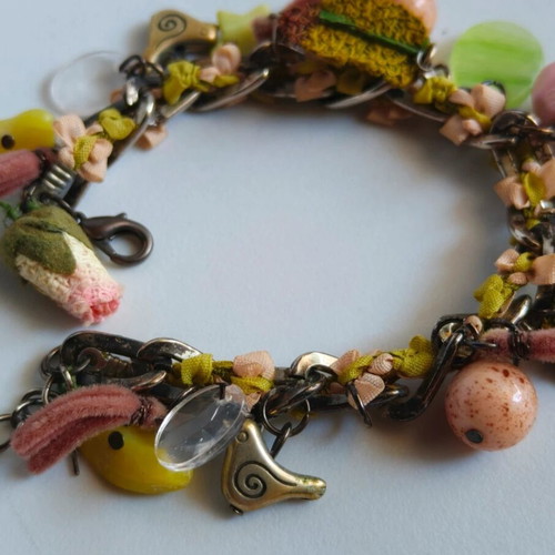 Handmade romantic bracelet like new with vintage charms