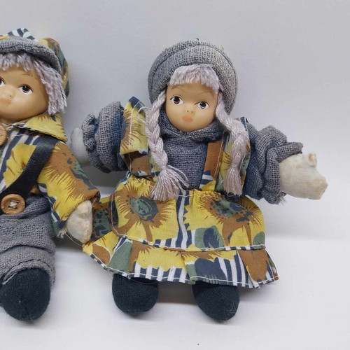 Three small collector dolls with ceramic faces like new