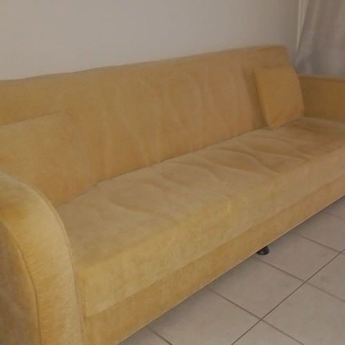 4-seat sofa bed with cover and two cushions