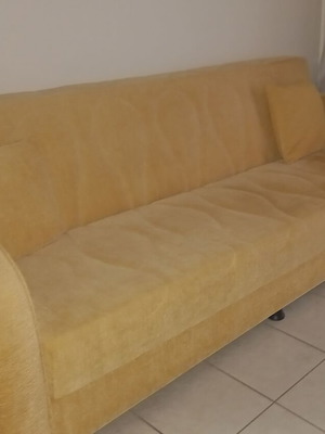 4-seat sofa bed with cover and two cushions