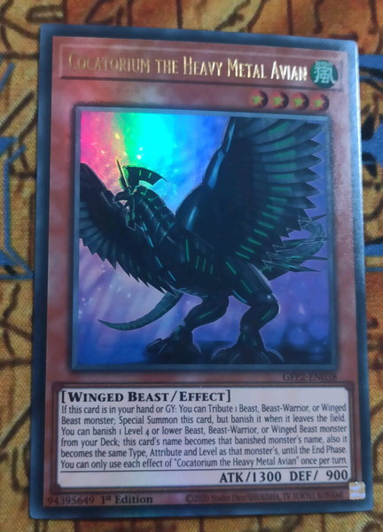 1) Cocatorium The Heavy Metal Avian (Ultra Rare, Yugioh)