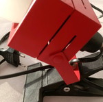 Vintage projector used with clip and red cable