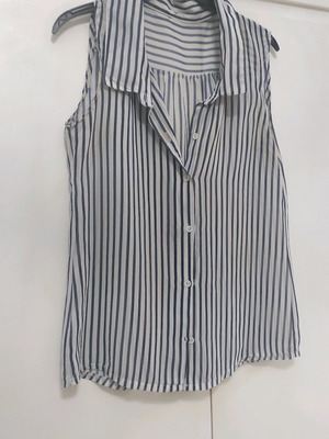 Striped sleeveless transparent shirt in excellent condition