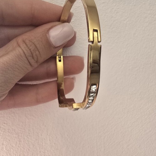 Steel bracelet in rose gold color with decorative stones, like new