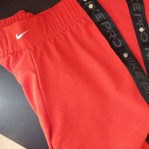 Nike pants red like new, size small