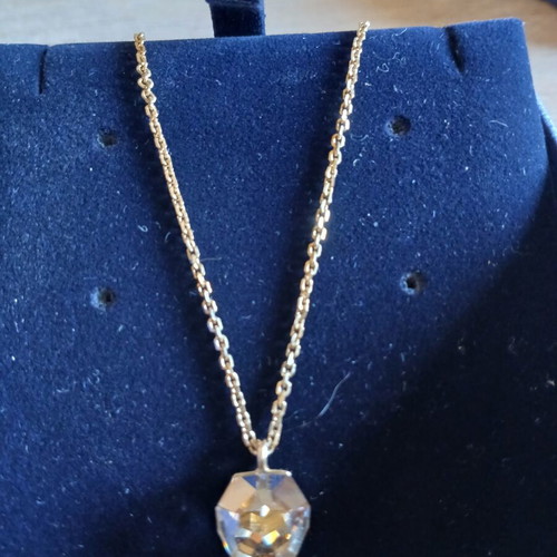 Swarovski necklace and bracelet set like new, gold color