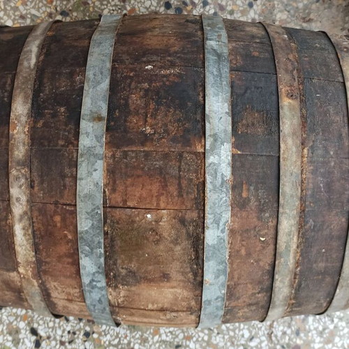 Old oak barrel used with cork stopper and plastic spigot