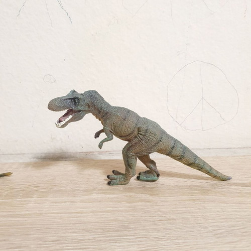 Dinosaur book like new with 3 dinosaur toys gift