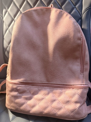 Backpack pink big with zips like new