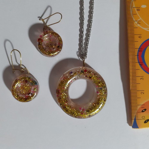 Two sets of handmade pendants and earrings, multicolor