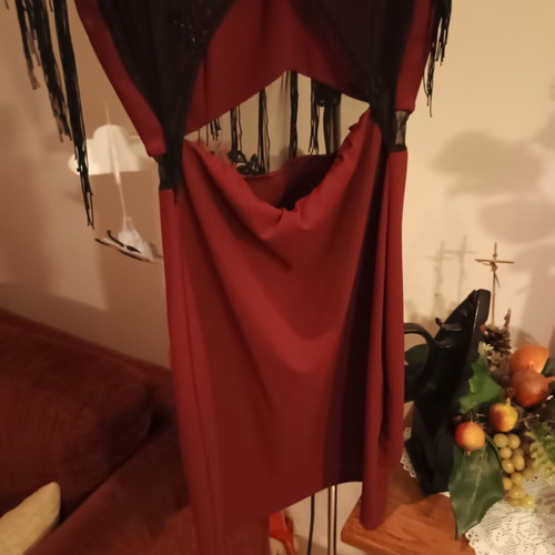 Midi dress for special occasions like new, burgundy with lace and fringes