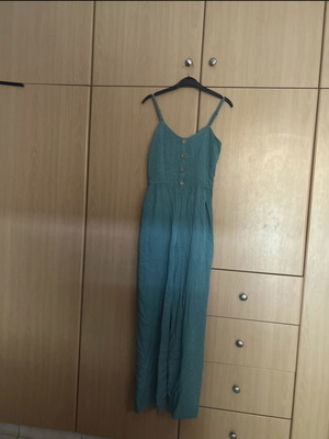 Teal jumpsuit size S new with wide-leg design