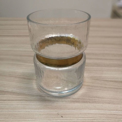 Decorative glass candle holder vase used with gold design